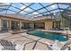 Beautiful home with a screened-in pool, inviting patio space, perfect for enjoying sunny days outdoors at 6801 Silver Charm Ct, Leesburg, FL 34748