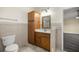 Bathroom featuring a vanity with drawers, cabinet, and tile backsplash at 723 Palma Dr, Lady Lake, FL 32159