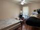 Bedroom with a bed frame and mattress at 1004 Matthew Ave, Lady Lake, FL 32159