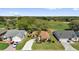 Aerial view of a well-maintained home overlooking a lush golf course in a vibrant community at 1029 Soledad Way, The Villages, FL 32159