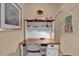 Dedicated home office area with a wooden desk and storage at 1029 Soledad Way, The Villages, FL 32159