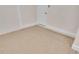 Spacious two car garage featuring epoxy floor, bright lighting, and neutral paint at 13334 Sw 107 St, Dunnellon, FL 34432