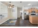 Bright kitchen nook with a view, showcasing modern stainless steel appliances and wooden cabinetry at 13753 Via Roma Cir, Clermont, FL 34711