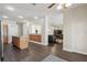 Open-concept living space with kitchen island flowing into the living area, great for entertaining at 13753 Via Roma Cir, Clermont, FL 34711