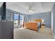 Comfortable primary bedroom with a king bed, carpet, and a large window for natural light at 1391 Willow Crest Dr, Clermont, FL 34711