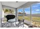 Covered patio with outdoor seating, a grill, and view of the backyard at 1391 Willow Crest Dr, Clermont, FL 34711