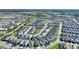 A scenic view overlooking the neighborhood showcasing the proximity to golf and pond at 1524 Flange Dr, Davenport, FL 33896