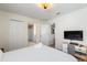 Bright bedroom with closet and ensuite bathroom access at 1524 Flange Dr, Davenport, FL 33896