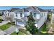 Beautiful two-story home with lush landscaping, featuring a paved driveway and an attached two-car garage at 1524 Flange Dr, Davenport, FL 33896