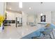 Modern kitchen featuring breakfast bar with seating and stainless steel appliances at 1524 Flange Dr, Davenport, FL 33896