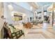 Open concept lobby with elegant seating and lighting fixtures, providing a relaxing community gathering space at 1524 Flange Dr, Davenport, FL 33896