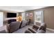 Well-lit theater room with comfortable seating, offering an ideal space for relaxing and enjoying movies at 1524 Flange Dr, Davenport, FL 33896