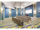 Community movie theater featuring comfortable seating, a large screen, and modern amenities at 1524 Flange Dr, Davenport, FL 33896