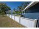 Well-maintained backyard featuring a privacy fence, manicured lawn, and mature trees, creating a peaceful outdoor oasis at 16 General Doolittle Rd, Daytona Beach, FL 32124