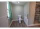 A cozy bathroom featuring modern flooring and a convenient walk-in shower at 16 General Doolittle Rd, Daytona Beach, FL 32124