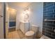 Bathroom features a modern vanity, toilet and tiled walls at 16 General Doolittle Rd, Daytona Beach, FL 32124