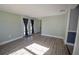 Spacious living room with glass patio doors at 16 General Doolittle Rd, Daytona Beach, FL 32124