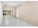 Spacious two car garage with block walls and door to the exterior at 16017 Harbar Oaks Dr, Montverde, FL 34756