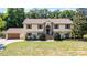 Beautiful home with manicured lawn, brick entry, and spacious two-car garage at 16017 Harbar Oaks Dr, Montverde, FL 34756