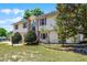 Spacious two-story home boasts a brick entryway and mature landscaping at 16017 Harbar Oaks Dr, Montverde, FL 34756