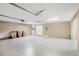 Spacious garage includes an automatic door, plenty of room, and three garbage receptacles at 16017 Harbar Oaks Dr, Montverde, FL 34756