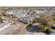 Neighborhood aerial view featuring manicured lawns, uniform roofing, and streetscapes at 16800 Se 80Th Bathurst Ct, The Villages, FL 32162