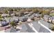 Aerial view of a neighborhood showcasing manicured lawns and similar roof styles at 16800 Se 80Th Bathurst Ct, The Villages, FL 32162