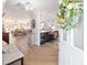 Inviting open-concept home with warm, bright living spaces and a view from the front door through to the kitchen at 16800 Se 80Th Bathurst Ct, The Villages, FL 32162