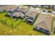 Bird's eye view of fenced backyards and patios in a well-maintained residential neighborhood at 17291 Saw Palmetto Ave, Clermont, FL 34714