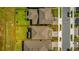 Aerial view highlighting property lines, roof, backyard with patio, in a residential neighborhood at 17291 Saw Palmetto Ave, Clermont, FL 34714