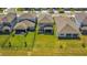 Aerial view of a well-maintained homes with fenced backyard and manicured lawn at 17291 Saw Palmetto Ave, Clermont, FL 34714