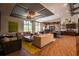 A modern lounge features stylish furniture, contemporary lighting, and large windows at 17291 Saw Palmetto Ave, Clermont, FL 34714