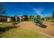 A fun playground offers a variety of play equipment in a community recreational area at 17291 Saw Palmetto Ave, Clermont, FL 34714
