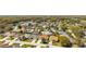 A residential neighborhood boasts tree-lined streets and well-maintained homes at 17416 Se 71St Currituck Ter, The Villages, FL 32162