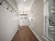 Bright entryway with wood floors, shiplap accent wall, and large windows at 17421 Woodfair Dr, Clermont, FL 34711