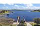 Community offers picturesque lake views with private boat docks and ramps at 17421 Woodfair Dr, Clermont, FL 34711