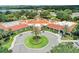 Expansive aerial view of the community clubhouse, showcasing meticulously maintained landscaping at 1970 Farmington Ct, Clermont, FL 34711