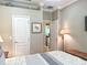 Bright bedroom with an entry, crown molding, and an inviting ambiance at 1970 Farmington Ct, Clermont, FL 34711