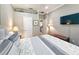 Bright, well-lit bedroom with bed, lamps, and stylish decor at 1970 Farmington Ct, Clermont, FL 34711