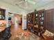 Inviting office area with custom built-in shelving and comfortable seating at 1970 Farmington Ct, Clermont, FL 34711