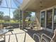 Relaxing outdoor patio with views of the golf course and lush landscaping at 1970 Farmington Ct, Clermont, FL 34711