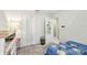 Bedroom features carpeted floors, a closet with white doors, and cartoon themed bedding at 212 Taft Dr, Davenport, FL 33837