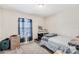 Bedroom features carpeted floors, a window with blue valance, and twin size bed at 212 Taft Dr, Davenport, FL 33837