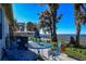 Relaxing patio with comfortable seating and a peaceful water view at 2225 Cypress Ct # 2C, Tavares, FL 32778
