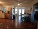 Spacious dining room featuring an eat-in kitchen, stainless steel appliances, and modern décor at 2416 Briarwood Ln, Eustis, FL 32726