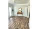 Living area featuring hardwood floors at 2416 Briarwood Ln, Eustis, FL 32726