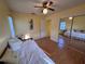 Bedroom featuring a daybed and mirrored closet doors at 25527 Oak Aly, Leesburg, FL 34748