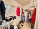 Walk-in closet with hanging rods and shelving for optimal storage at 25527 Oak Aly, Leesburg, FL 34748
