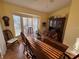 Charming dining room featuring a bay window and a classic china cabinet at 25527 Oak Aly, Leesburg, FL 34748