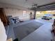 Spacious two car garage with storage and access to the driveway at 25527 Oak Aly, Leesburg, FL 34748